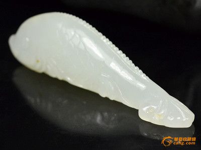 白玉金龍魚風水作用是什么：白玉金龍魚作為一種風水吉祥物