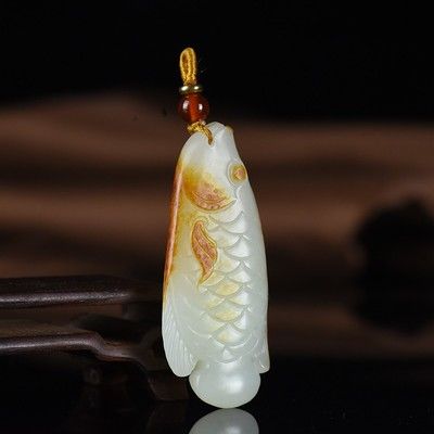 金龍魚玉雕掛件：金龍魚玉雕掛件是一種中國(guó)傳統(tǒng)工藝品 龍魚百科 第1張